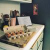 Carton of brown eggs on a kitchen counter